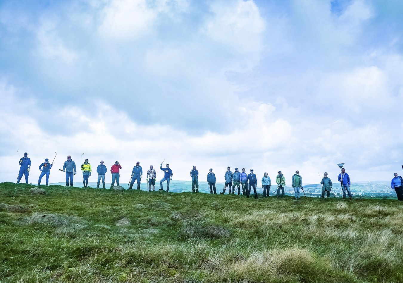 Lots of people at the top of a hill