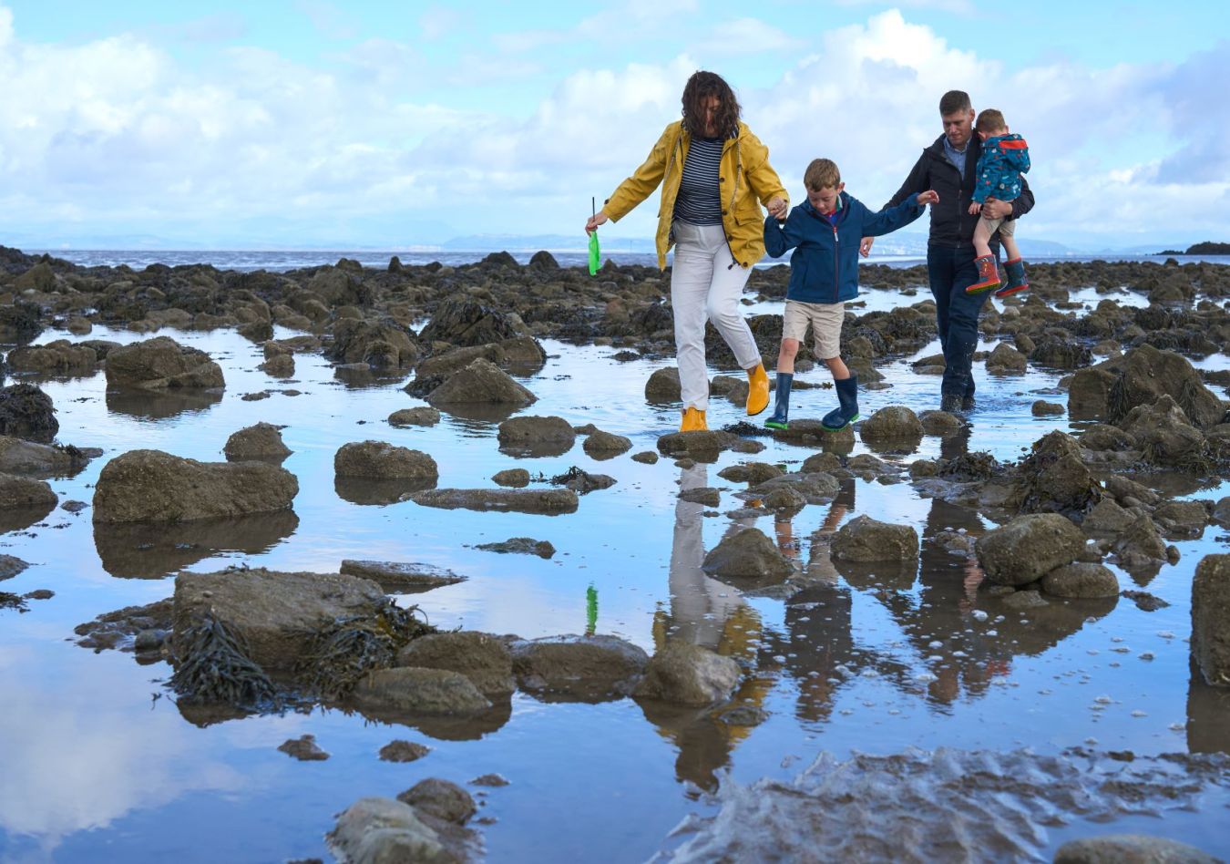 Family Enjoying Half Moon Bay Wildeymedia