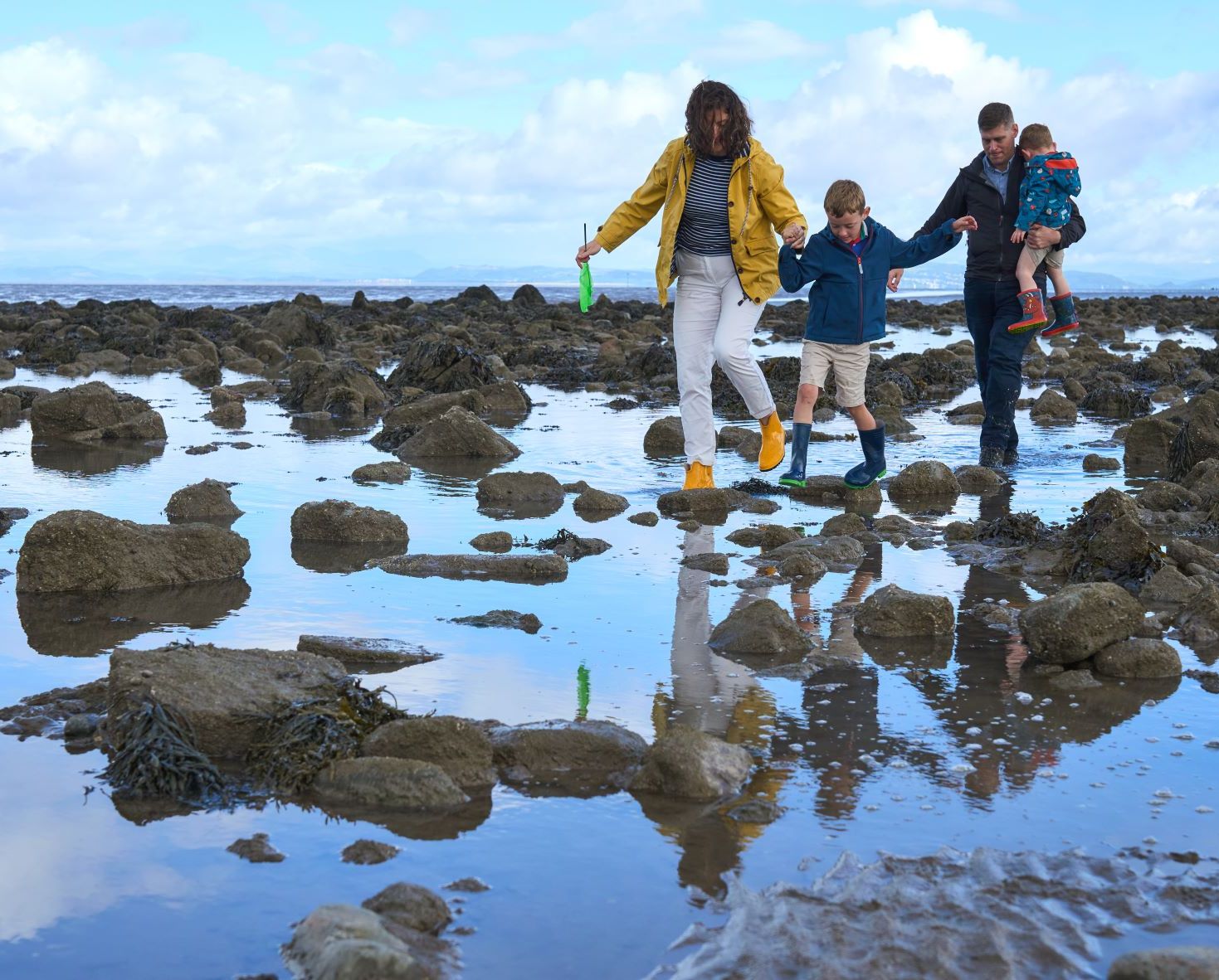 Family Enjoying Half Moon Bay Wildeymedia