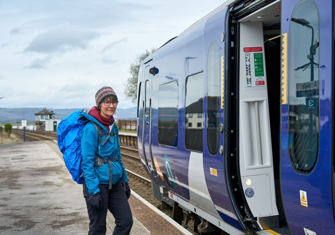 Walker Boarding A Train At Arnside Wildeymedia Scaled